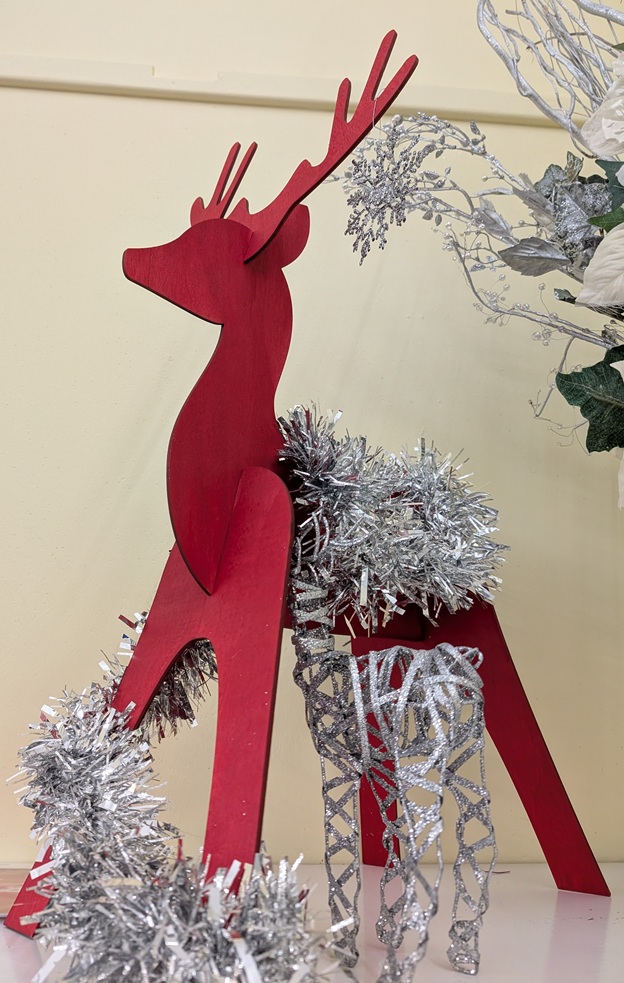 Festive reindeer Christmas decoration with silver tinsel, photo taken at last year's quiz.